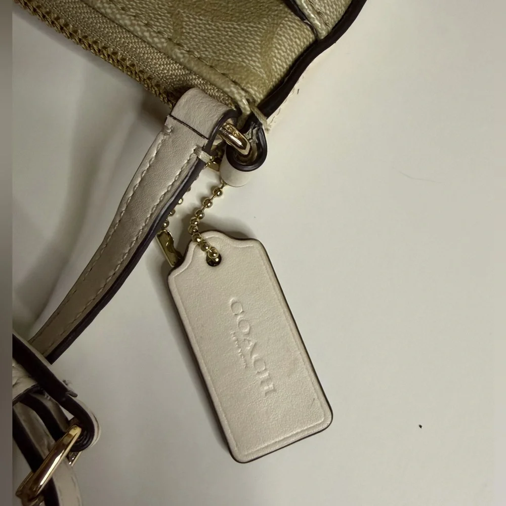 Coach Signature Tan‎ Beige Crossbody Bag with golden hardware